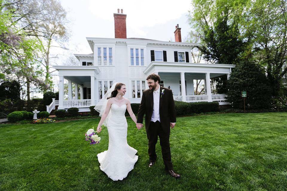 Newlyweds walking outside the venue