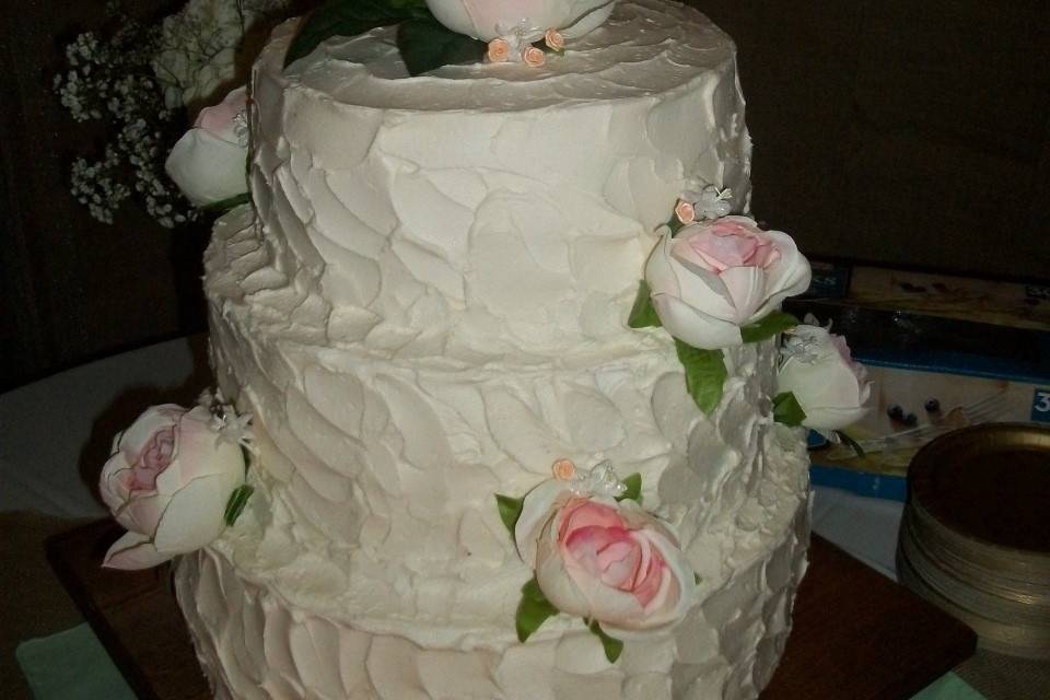 Ivory butter cream with blush silk flowersSize:  10, 12, & 14