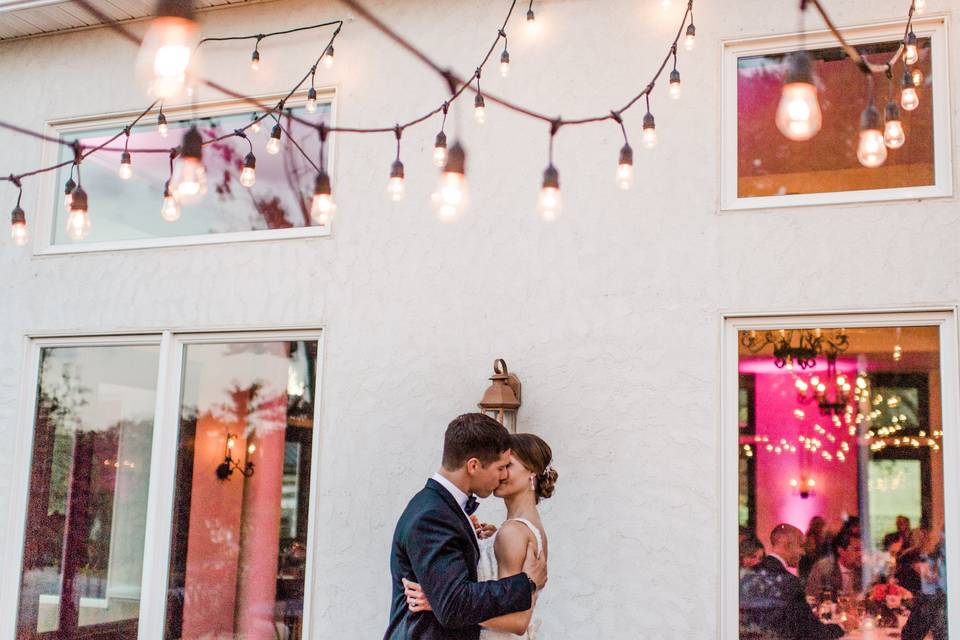 Kiss under the string lights