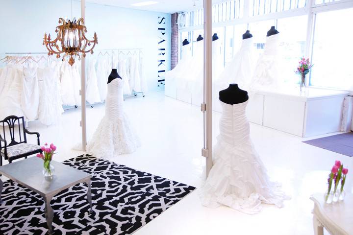 Welcome to SPARKLE bridal couture! Finally a bridal salon  just for us sizes 14-30 and our curves! This is a photo of our showroom and front lounge area. Come by for a visit, we hope to see you soon! :)