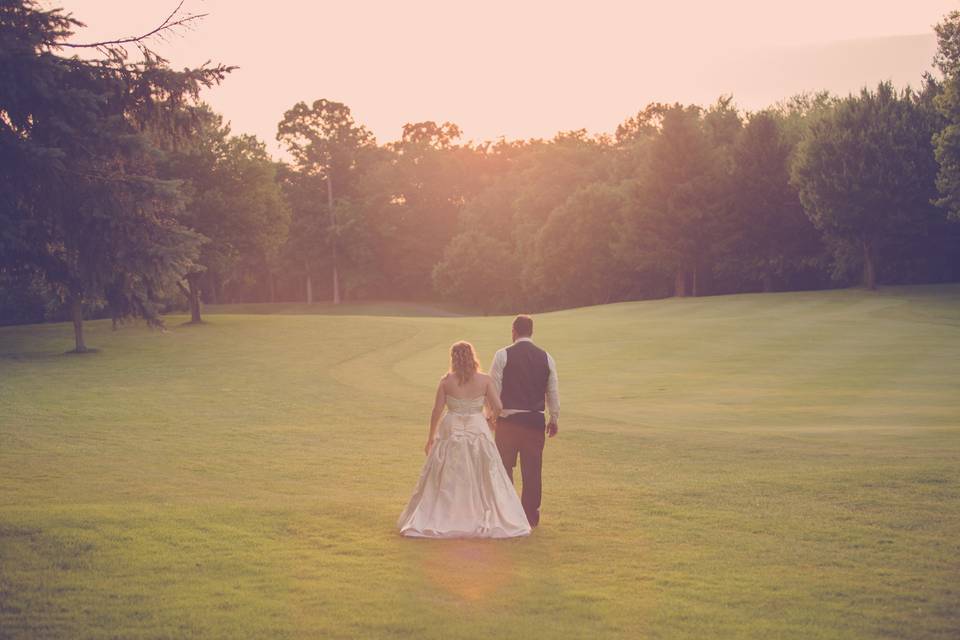 Newlyweds by the field