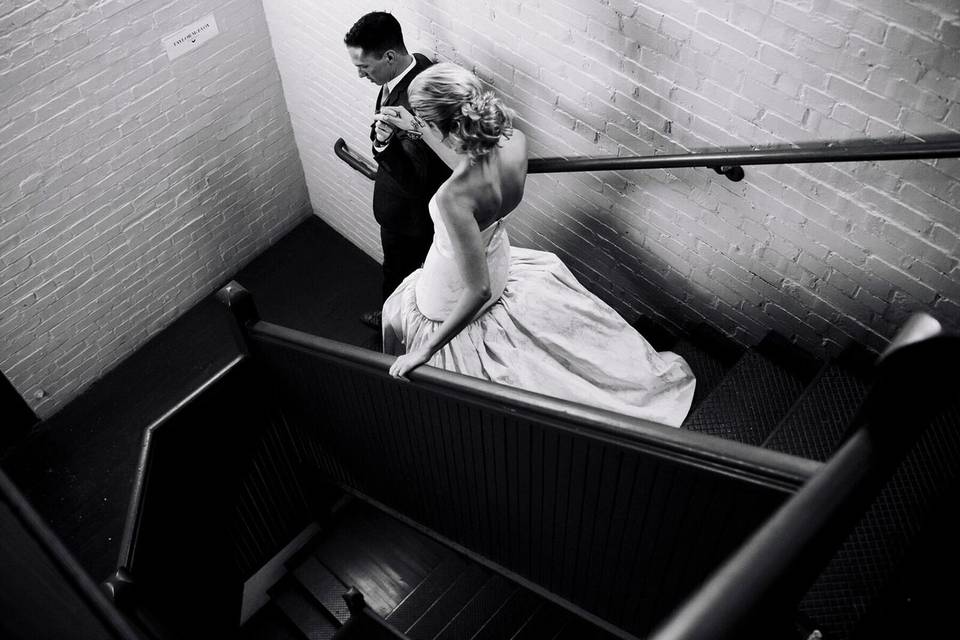 Newlyweds going down the stairs