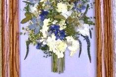 a preserved bridesmaid bouquet from the wedding of next photo..flowers by 