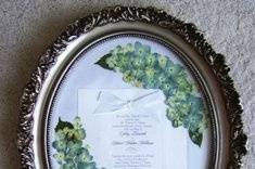 the bride chose to display only the hydrangea from her bouquet for a classically simple, yet elegant look