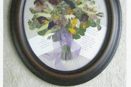 the bouquet is displayed with the invite and the response card to balance the effect