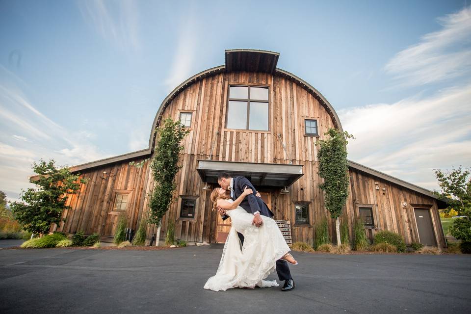 Couple in front of the barn