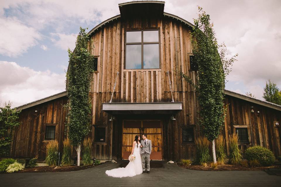 Couple in front of Barn