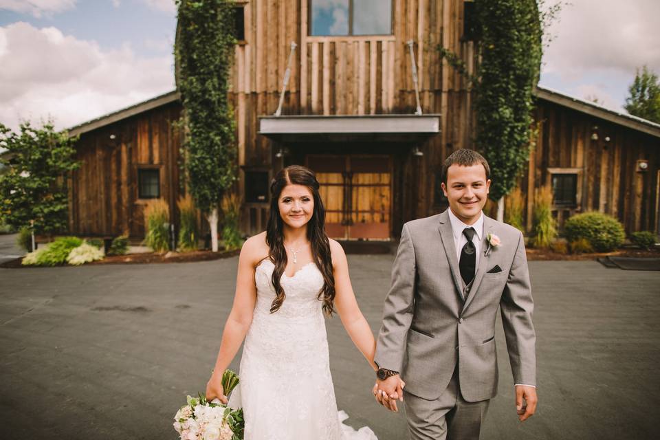 Couple in front of Barn