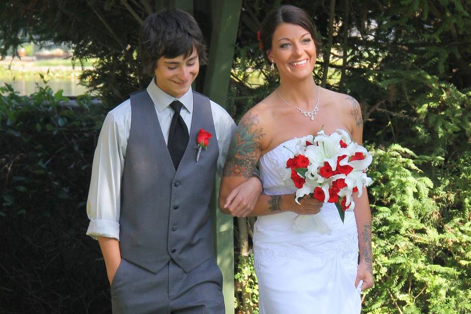 Son walking Bride down the Isle