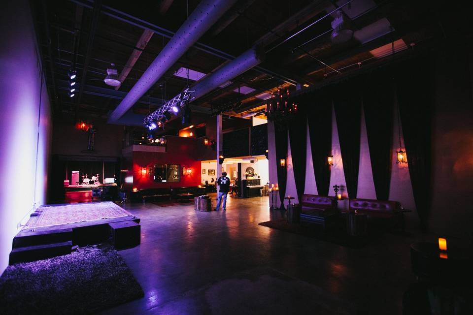 The large room, capacity of 300, has upstairs VIP viewing areas, a modular stage, and a variety of furnishings.