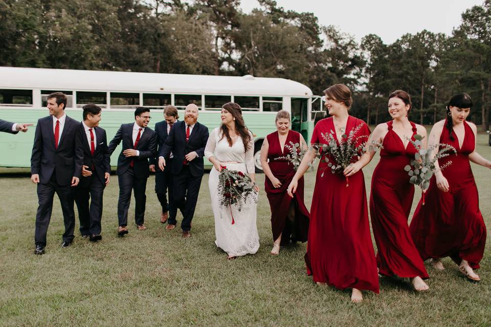 Newlyweds, bridesmaids, and groomsmen