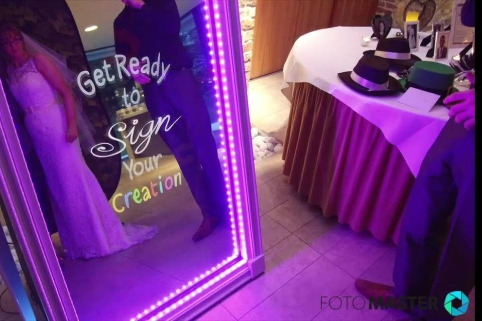 Mirror booth with purple lighting