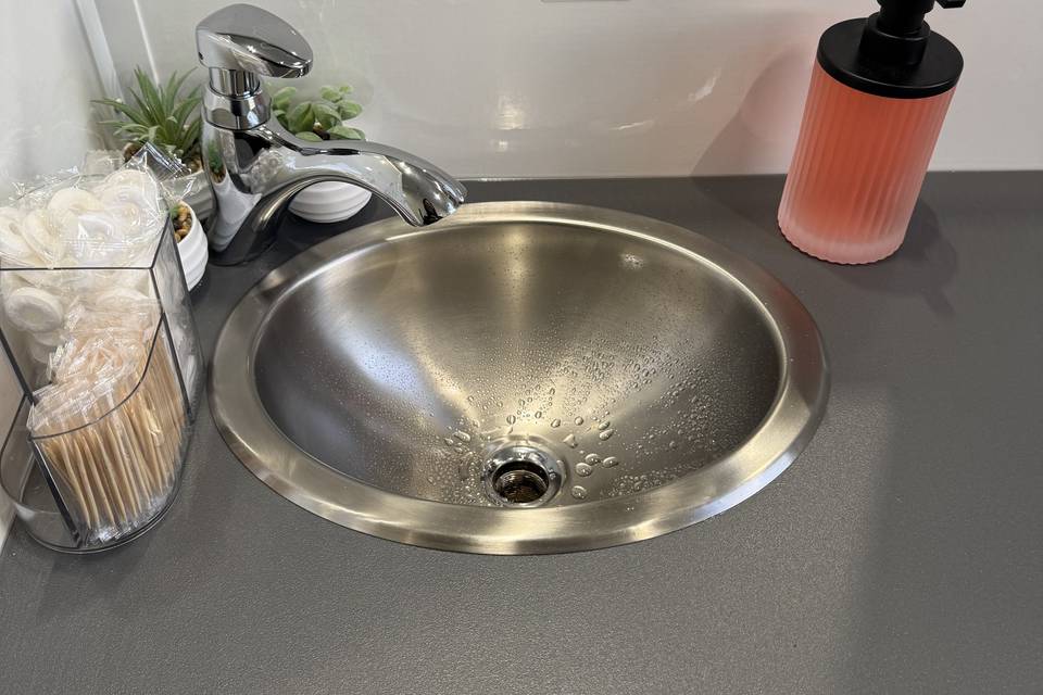 Wedding restroom, steel sink