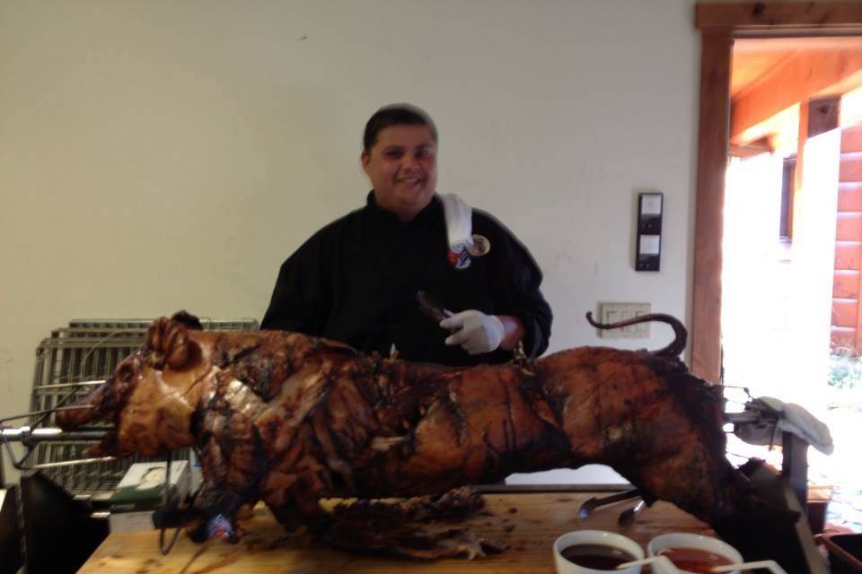 Chef Mike preparing a pig roast