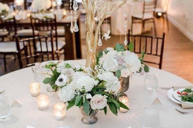 Round table setup with centerpiece