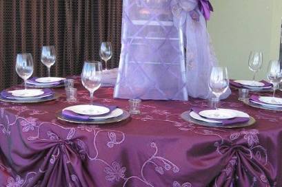 Purple Iridescent Taffeta with Plum Tinseltown Overlay. Lavender Diamond Organza Chair Back Sleeve and the Lavender Passion Vine organza garnishing.