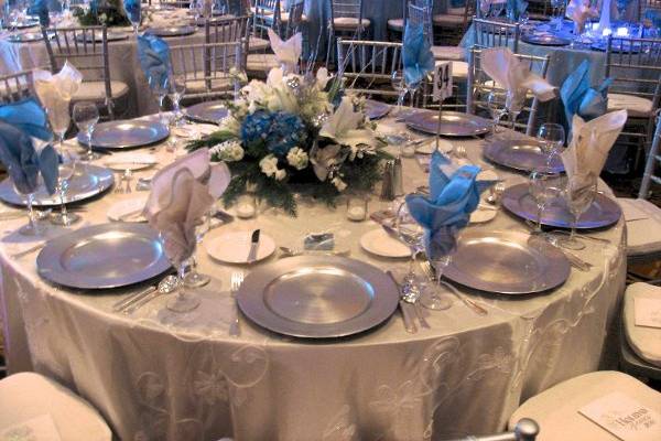 White Tinseltown Linen with White and Light Blue Napkins and Silver Charger