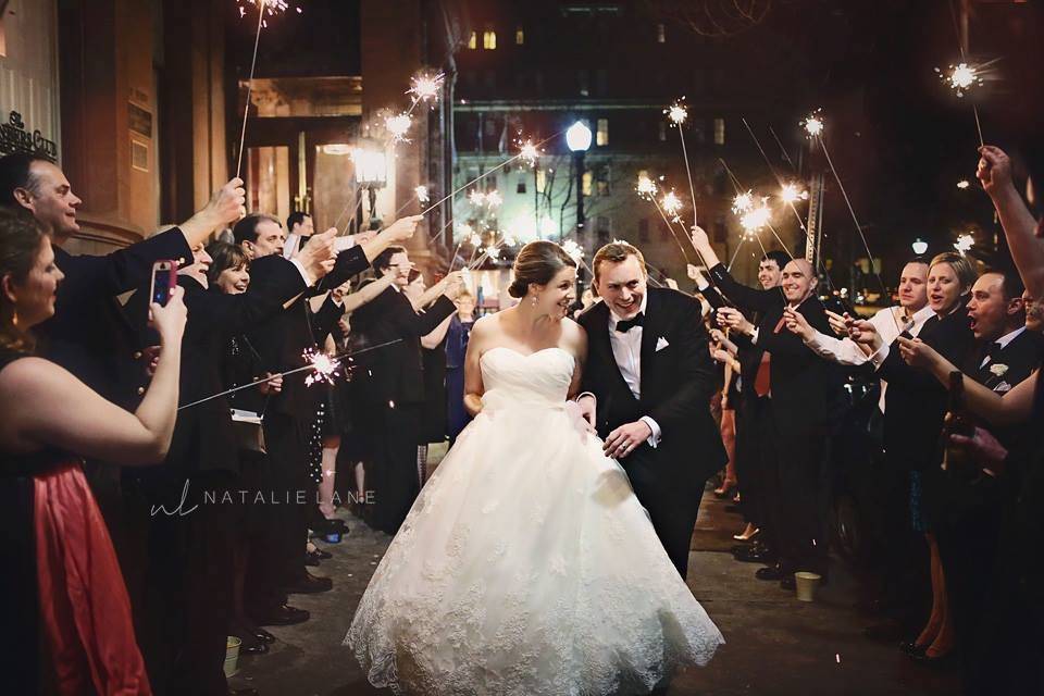 Newlywed couple sparkler exit