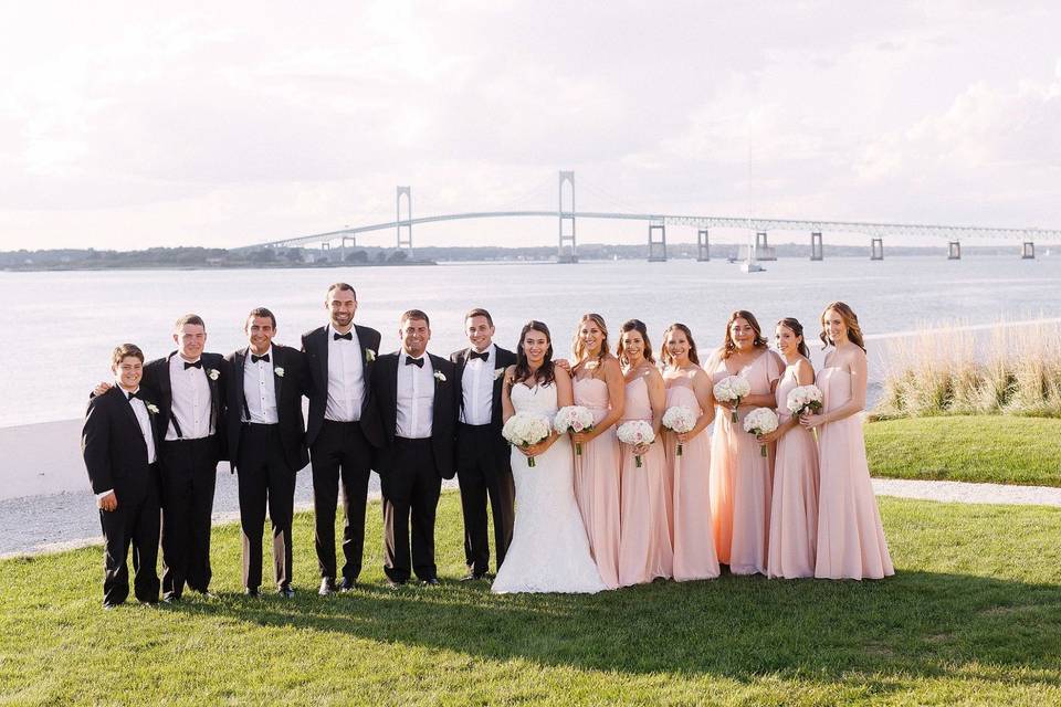 The couple with the bridesmaids and groomsmen