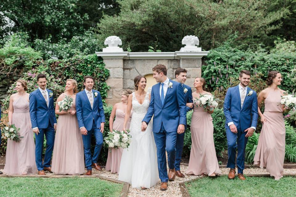 Newlyweds and their guests on the stairs