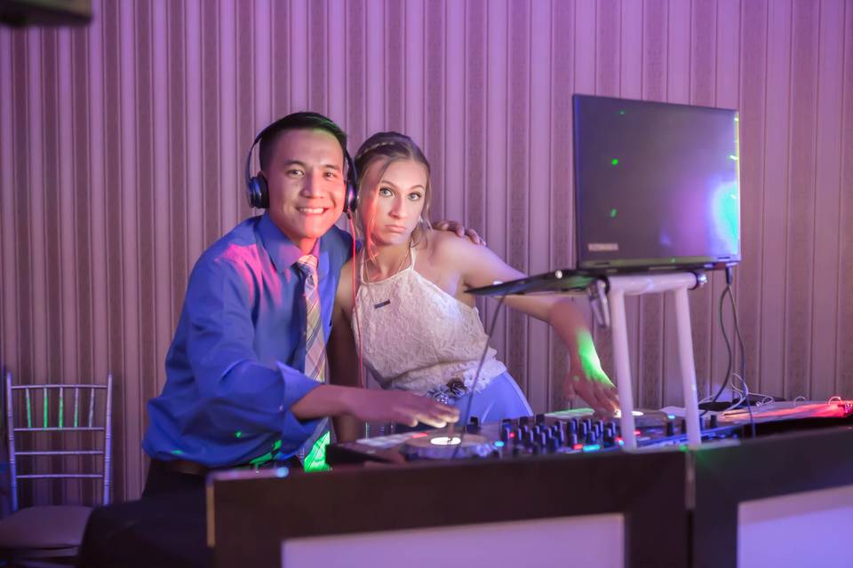 DJ and a bridesmaid