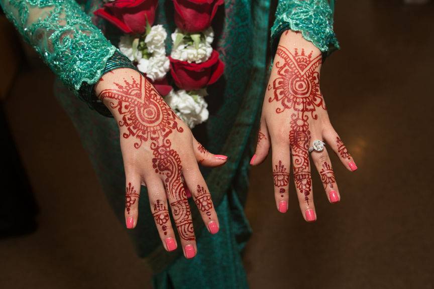 Henna design on brides' hands