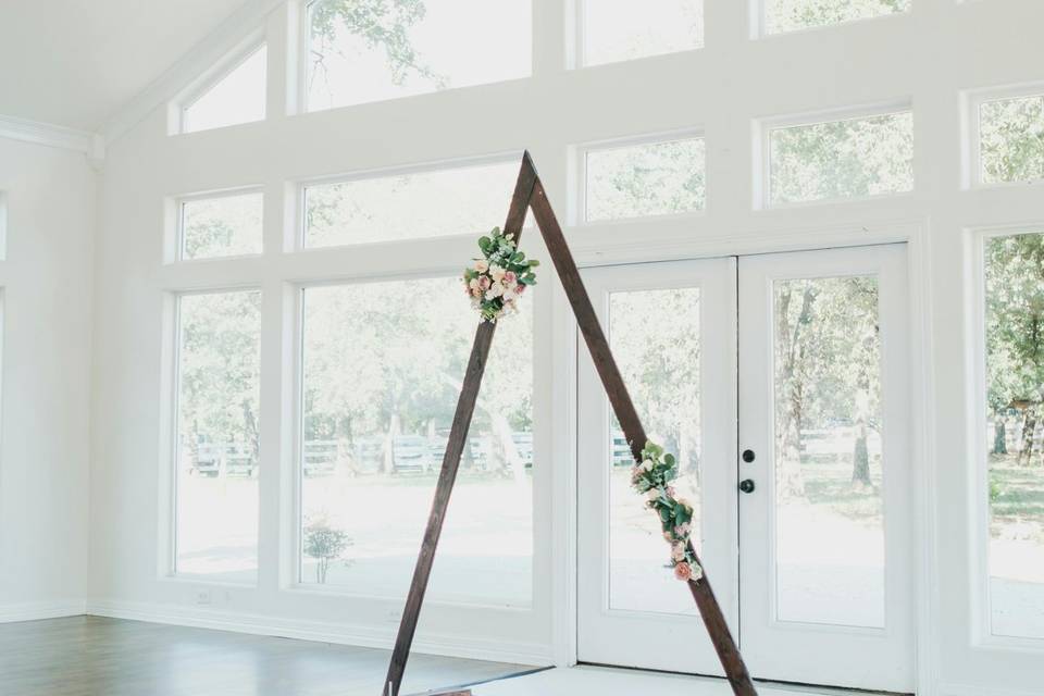 Ceremony arch and chairs