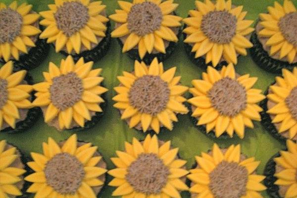 German Chocolate cupcakes with chocolate frosting and fondant sunflowers.