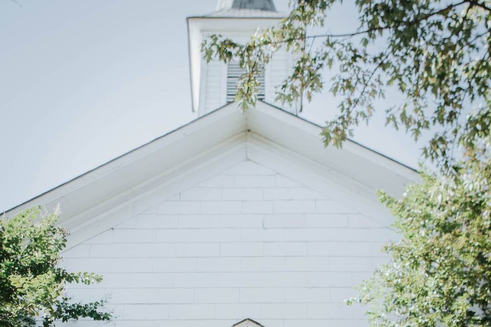 Couple kiss at the altar