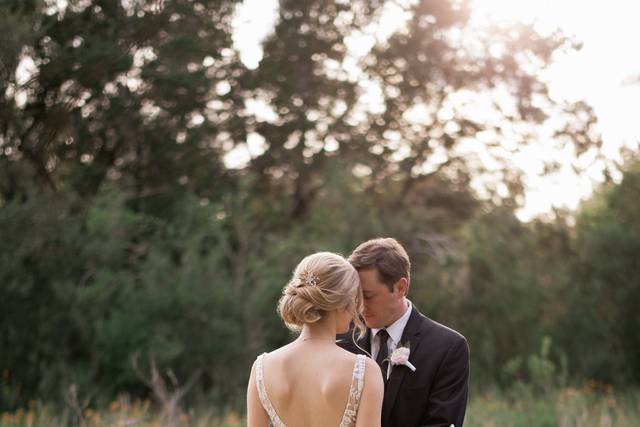 Bride and Groom in wildflowers