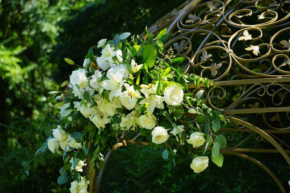 Floral decor for an iron arbor