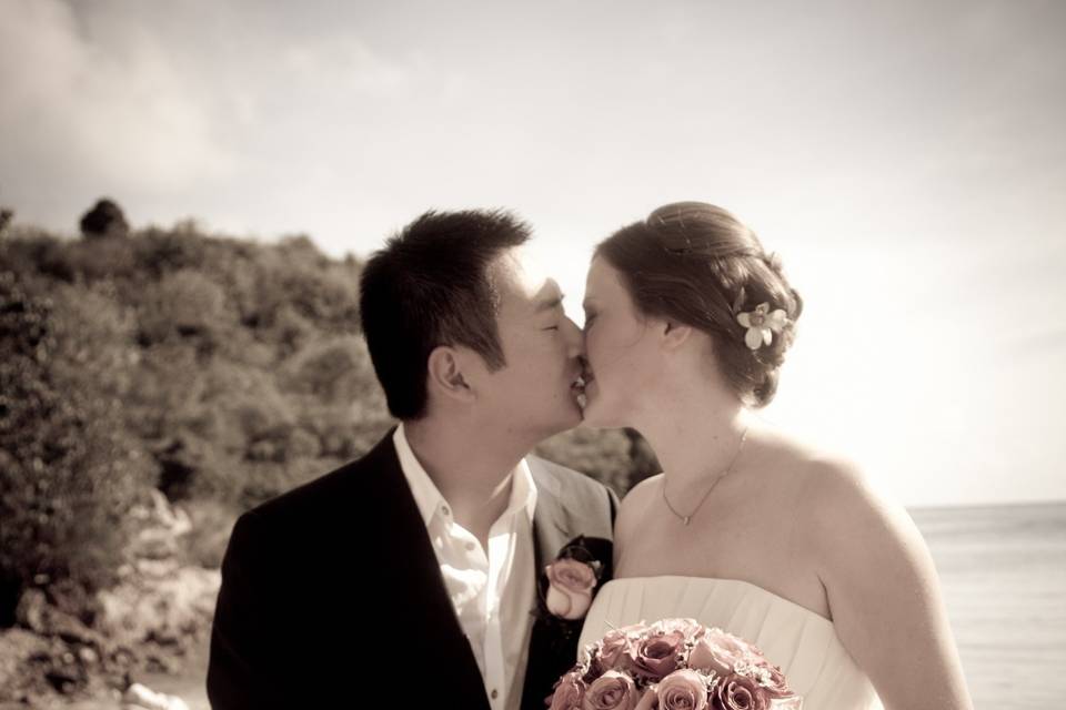 Newlyweds kissing