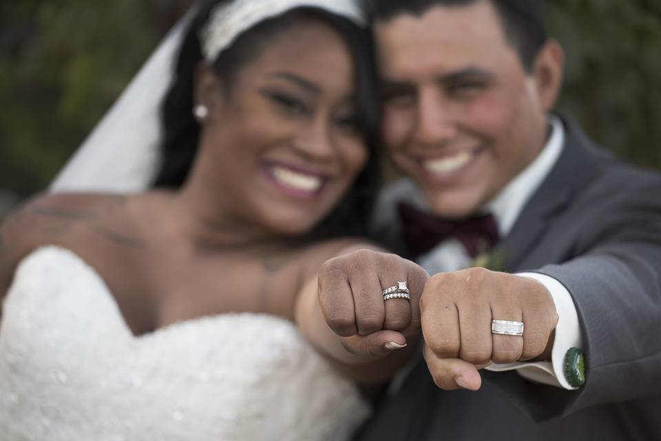 Couple showing off rings