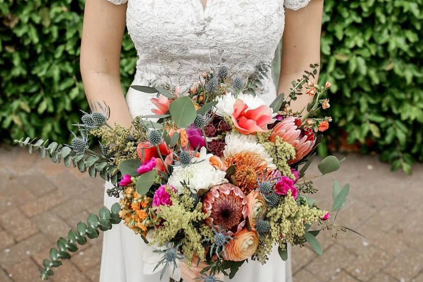 Glowing bride and bouquet