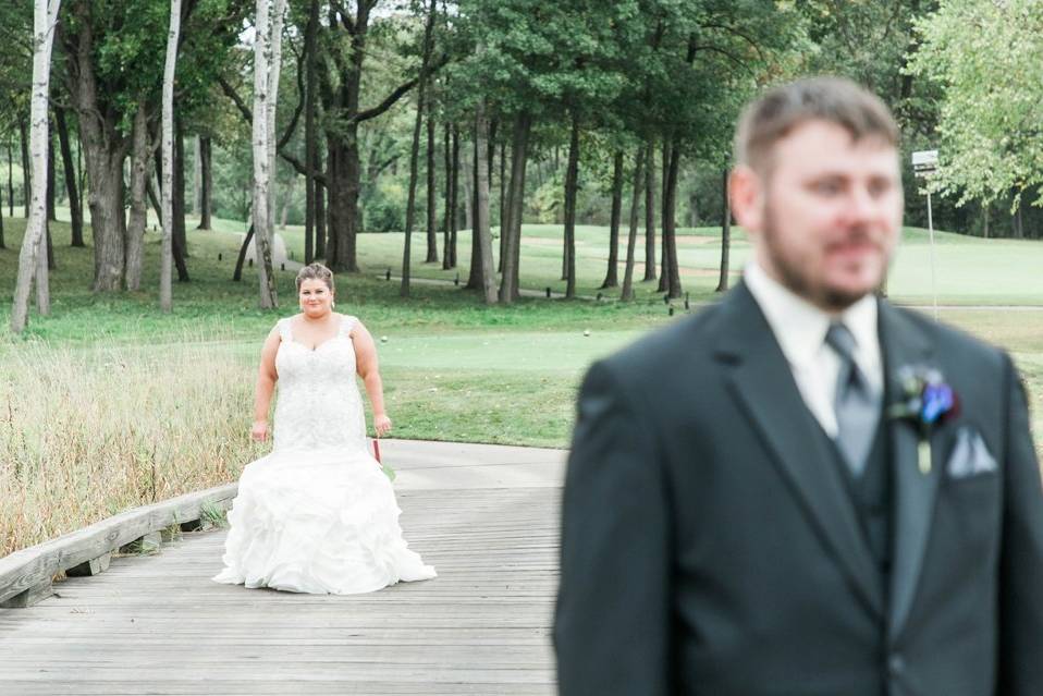 The bride approaching her groom