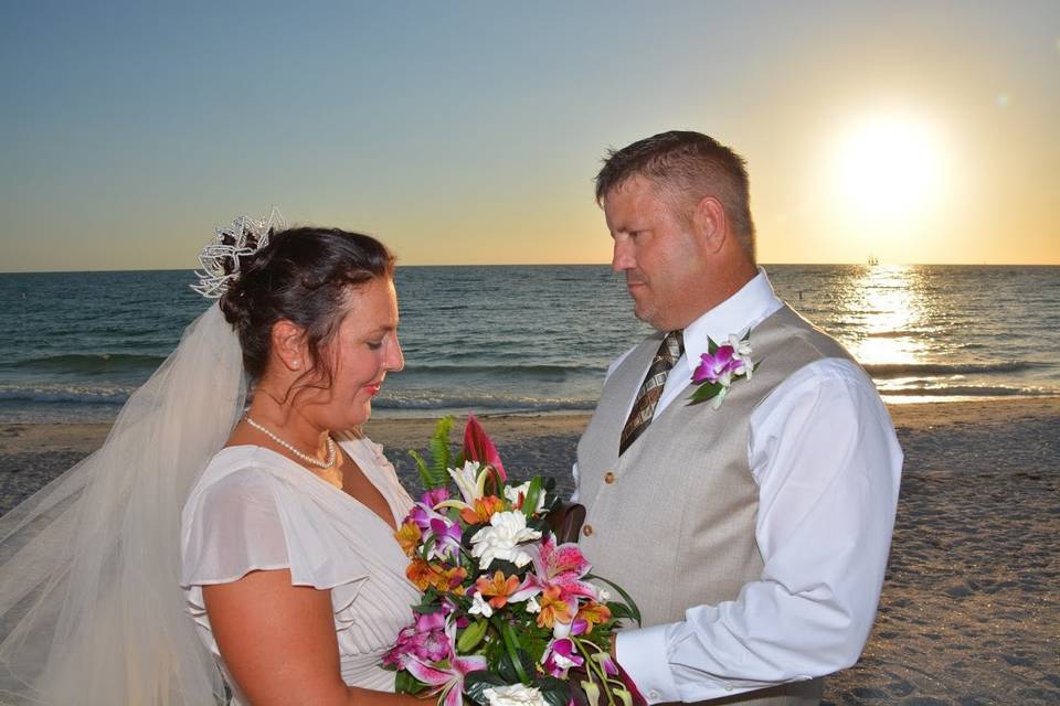 Newlyweds on a heart of flowers