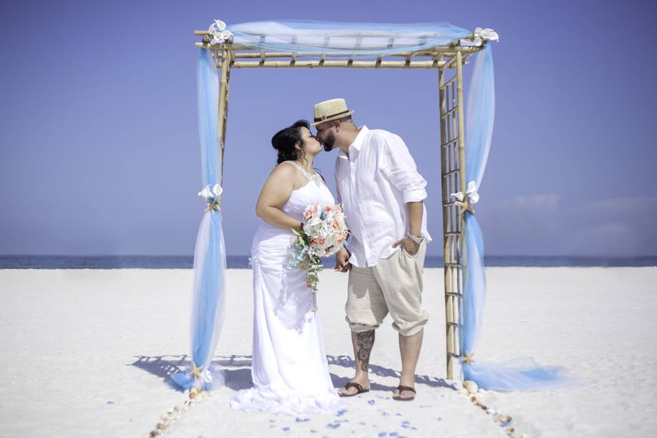 Newlyweds kissing