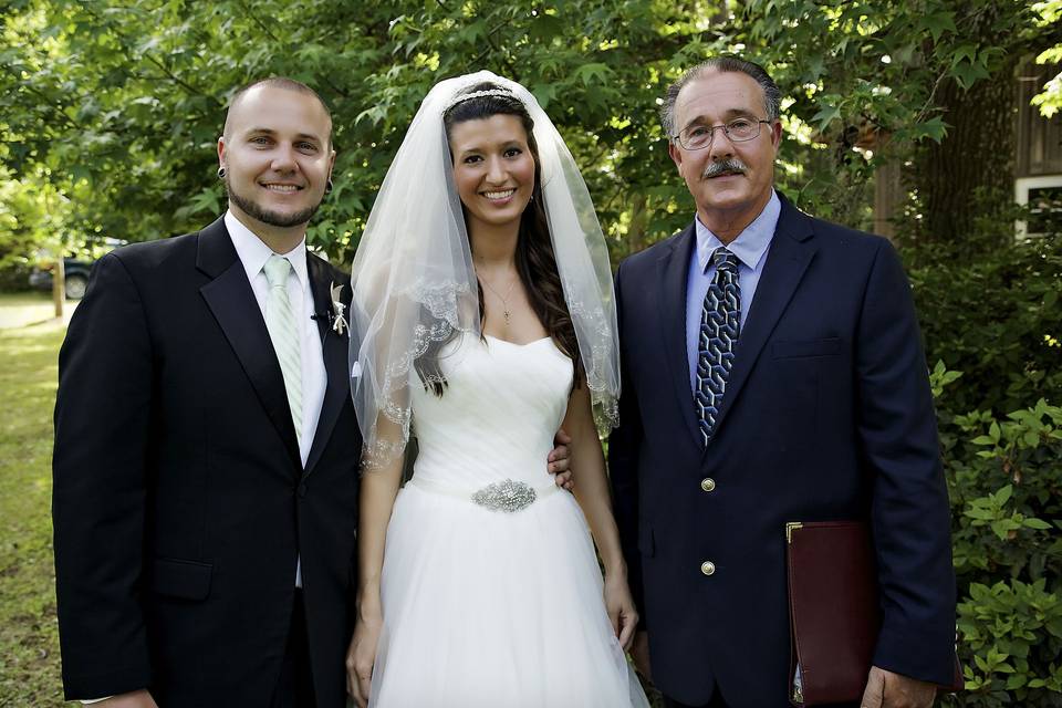 Newlyweds and the officiant