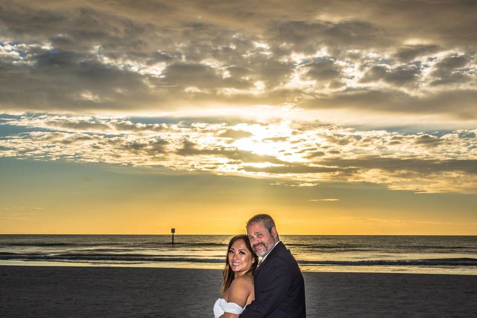 Newlyweds on a heart of flowers