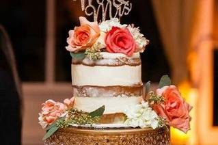Naked cake with flower toppers
