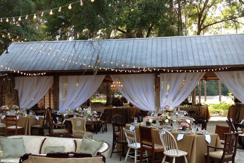Rustic barn turned soft and romantic for this couple's wedding reception