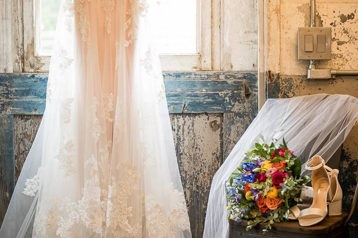 Brides dress shoes and flowers