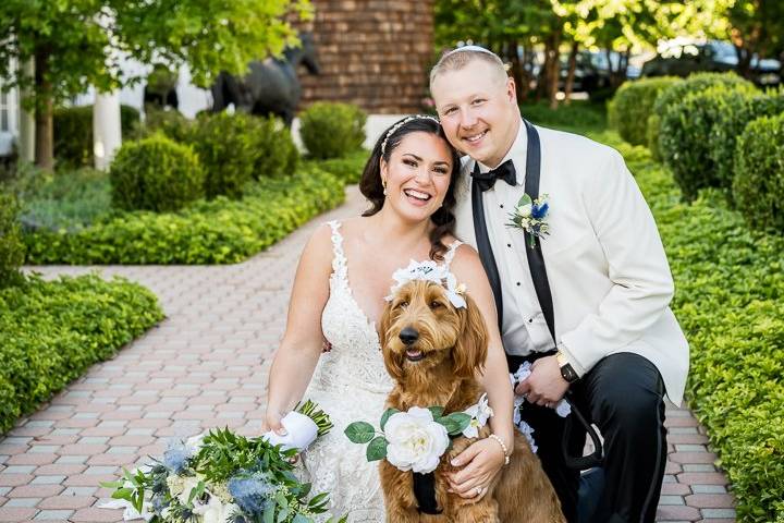 Wedding couple with their dog