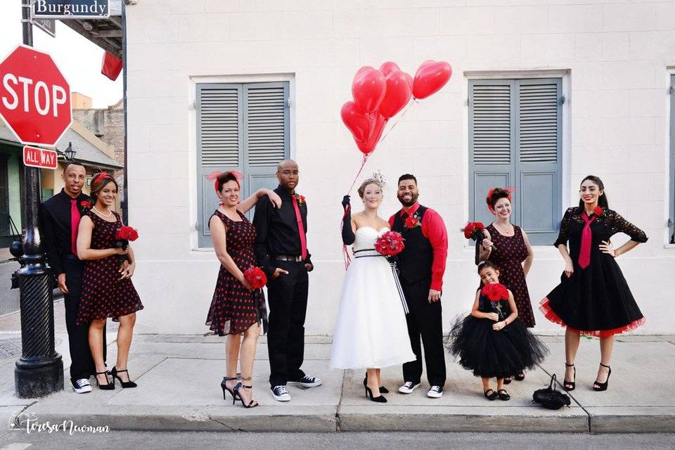 The couple with the bridesmaids and groomsmen