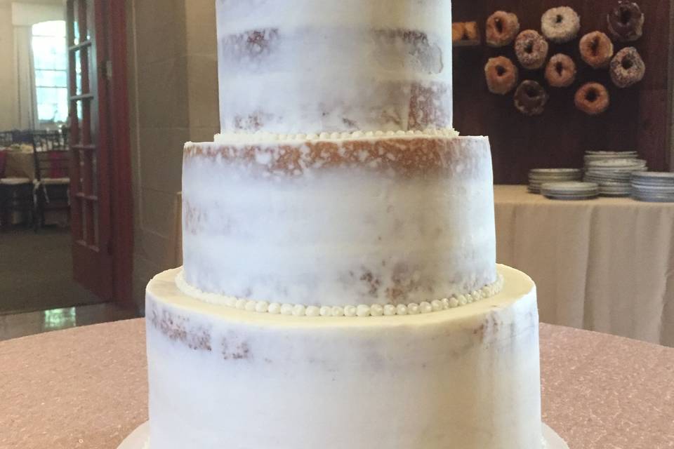 Semi-naked cake ready for fresh flowers.