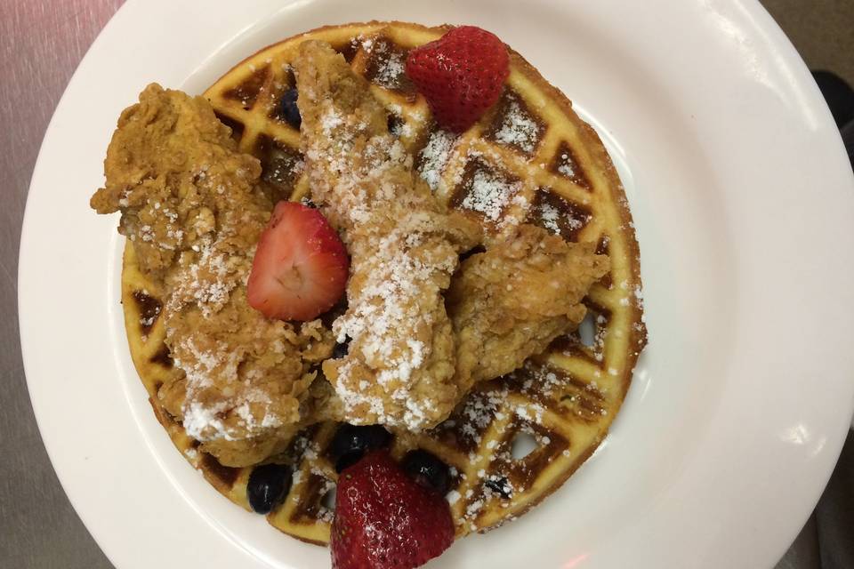 Chicken and Waffles topped with Straberries