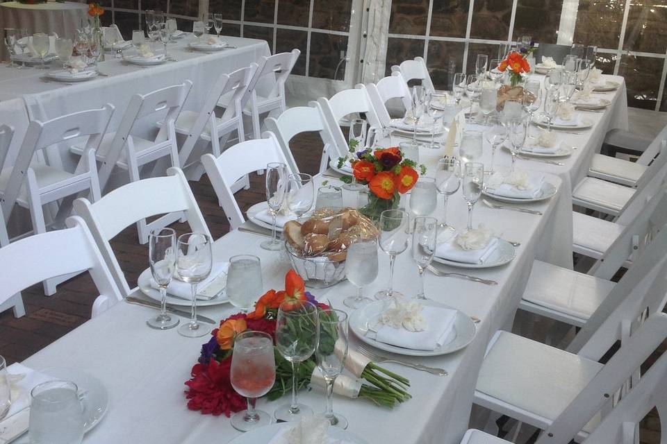 The white tables and chairs