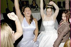 The bride dancing with their guests