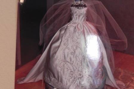 Custom bridal doll made to simulate the bride's gown.