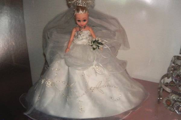 Custom bridal doll to simulate the bride's gown.